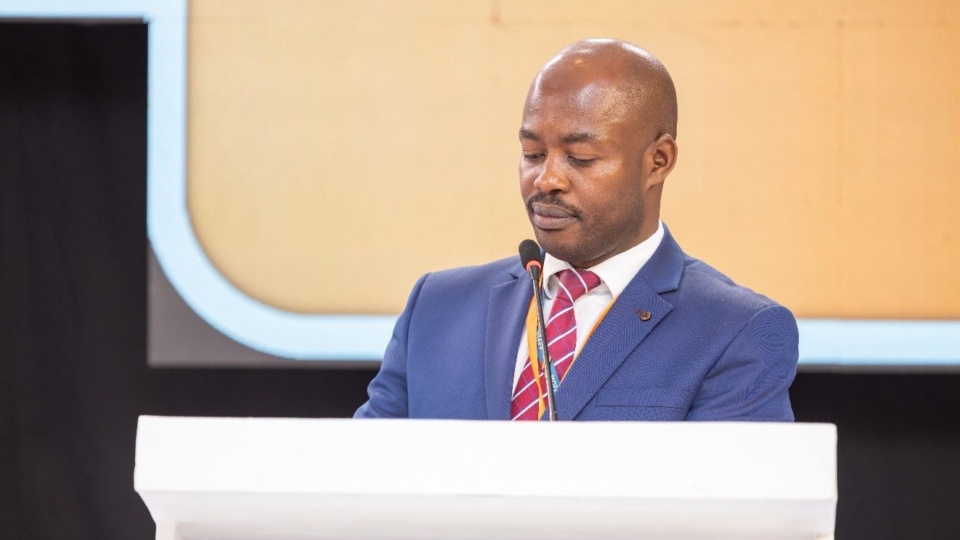 A speaker addressing the Forum from the lectern.